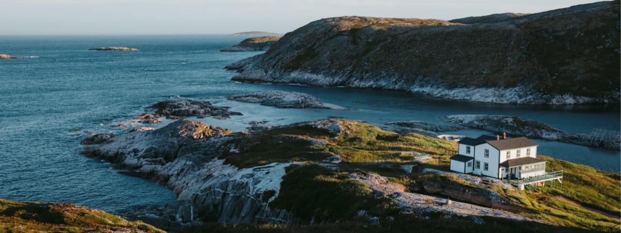 Coastal community house along the Bay of Islands shoreline
